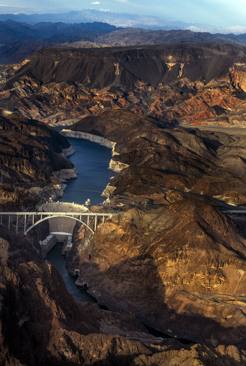 An aerial view of Hoover Dam and Mike O'Callaghan–Pat Tillman Memorial Bridge with the Colora ...
