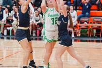 Photo courtesy Thomas Ranson/Lahontan Velley News Boulder City's Kyra Stevens blocks Fallo ...