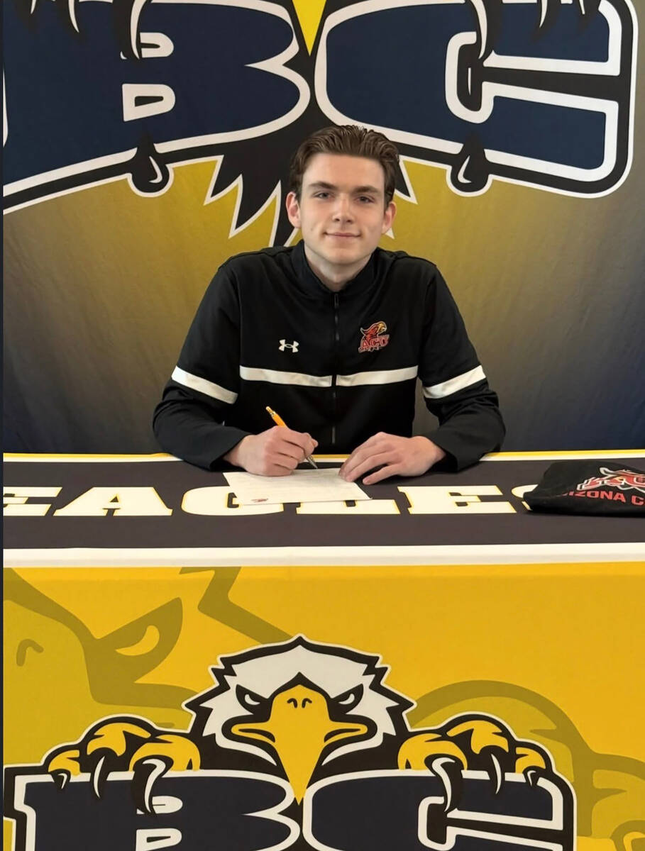 Photo courtesy BCHS Preston Van Beveren signs his letter of intent to play volleyball at Arizon ...