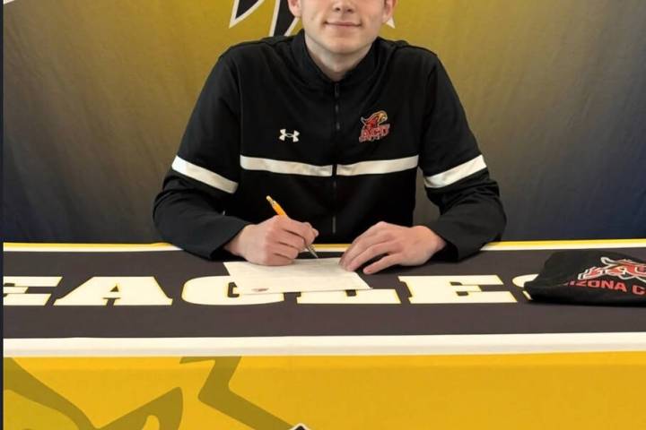 Photo courtesy BCHS Preston Van Beveren signs his letter of intent to play volleyball at Arizon ...