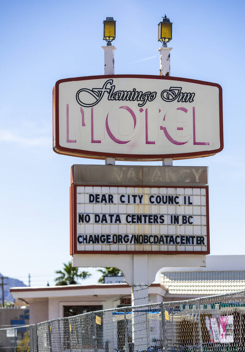 The gated Flamingo Inn Motel has a "No Data Centers" message on their marquee as proj ...