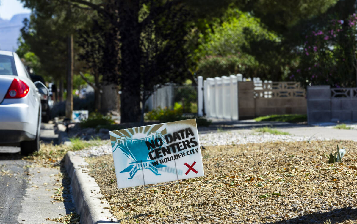 Homes about town have "No Data Centers" signs in their front yards as project represe ...
