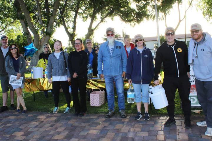 Ron Eland/Boulder City Review Saturday, volunteers got a 7 a.m. start for Shine Boulder City, h ...