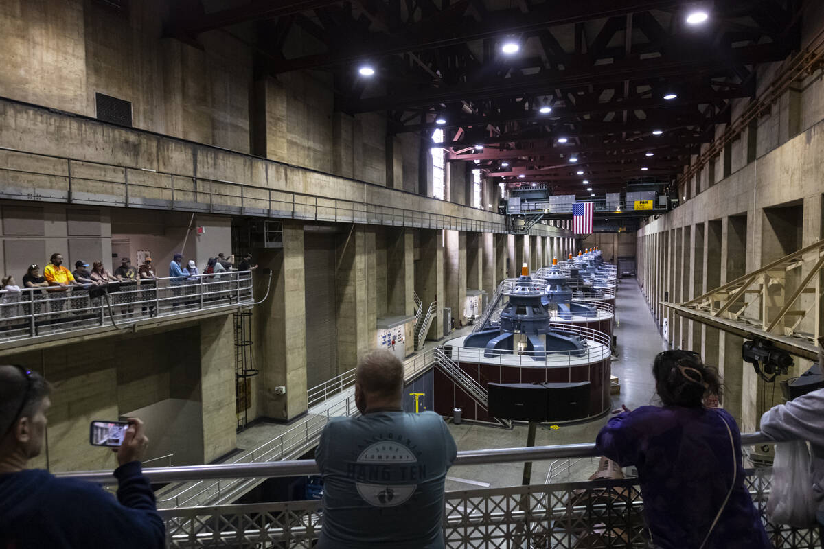 People take in views of the power plant at Hoover Dam during a guided tour on Sunday, April 26, ...