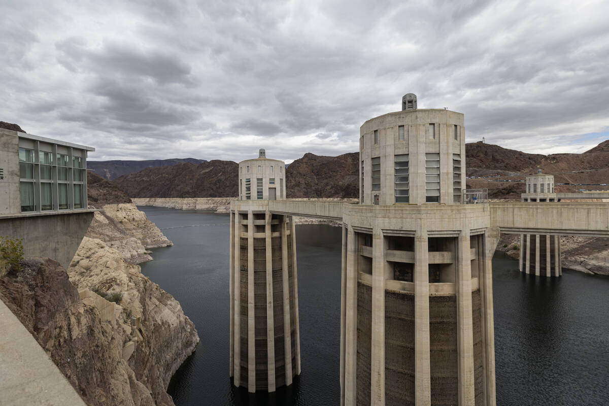 The Colorado River flows into the Hoover Dam on Sunday, April 26, 2026, outside of Las Vegas. ( ...