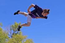 Photos by Ron Eland/Boulder City Review A member of the Flippenout Trampoline team appears to b ...