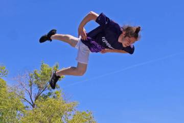 Photos by Ron Eland/Boulder City Review A member of the Flippenout Trampoline team appears to b ...