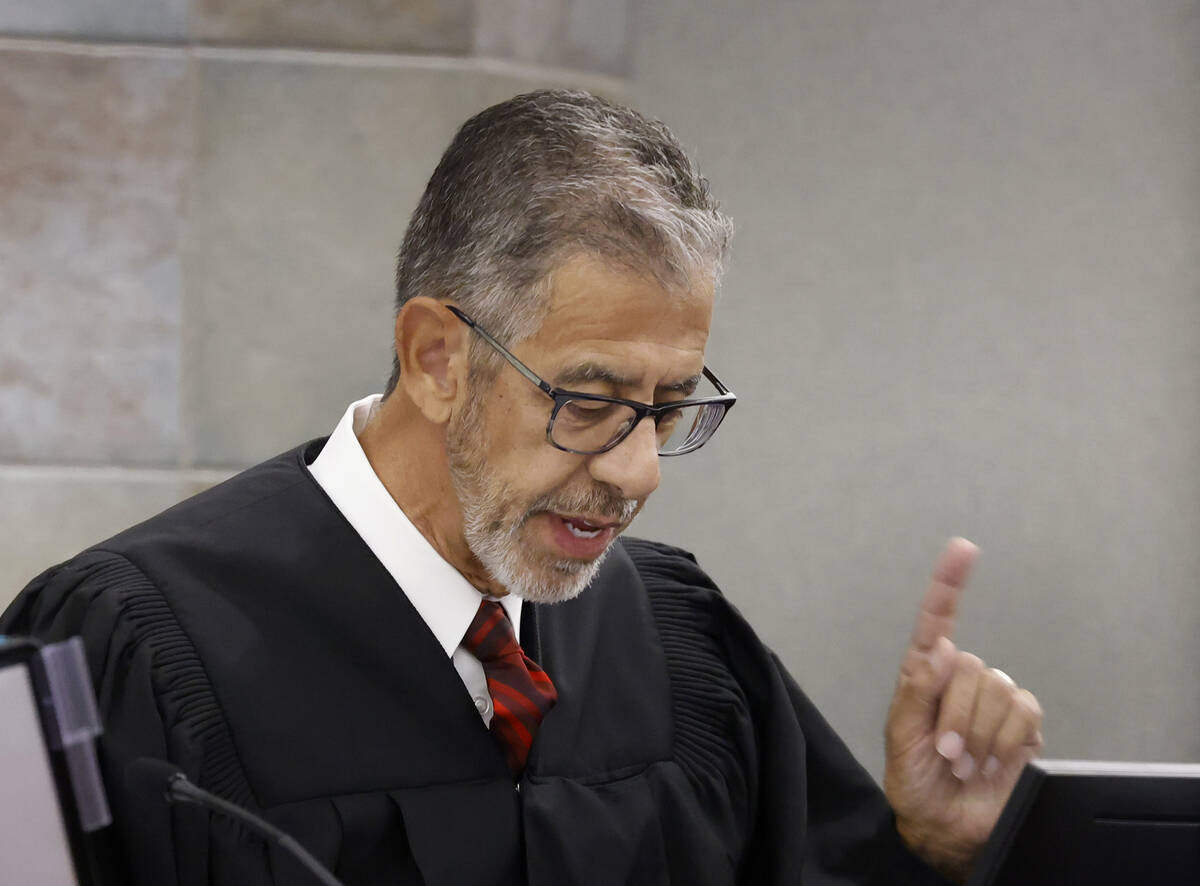 District Judge Michael Villani presides over an arraignment for Frank Mariani, a former Boulder ...