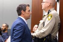 Frank Mariani, center, a former Boulder City High School football coach who is accused of lewdn ...