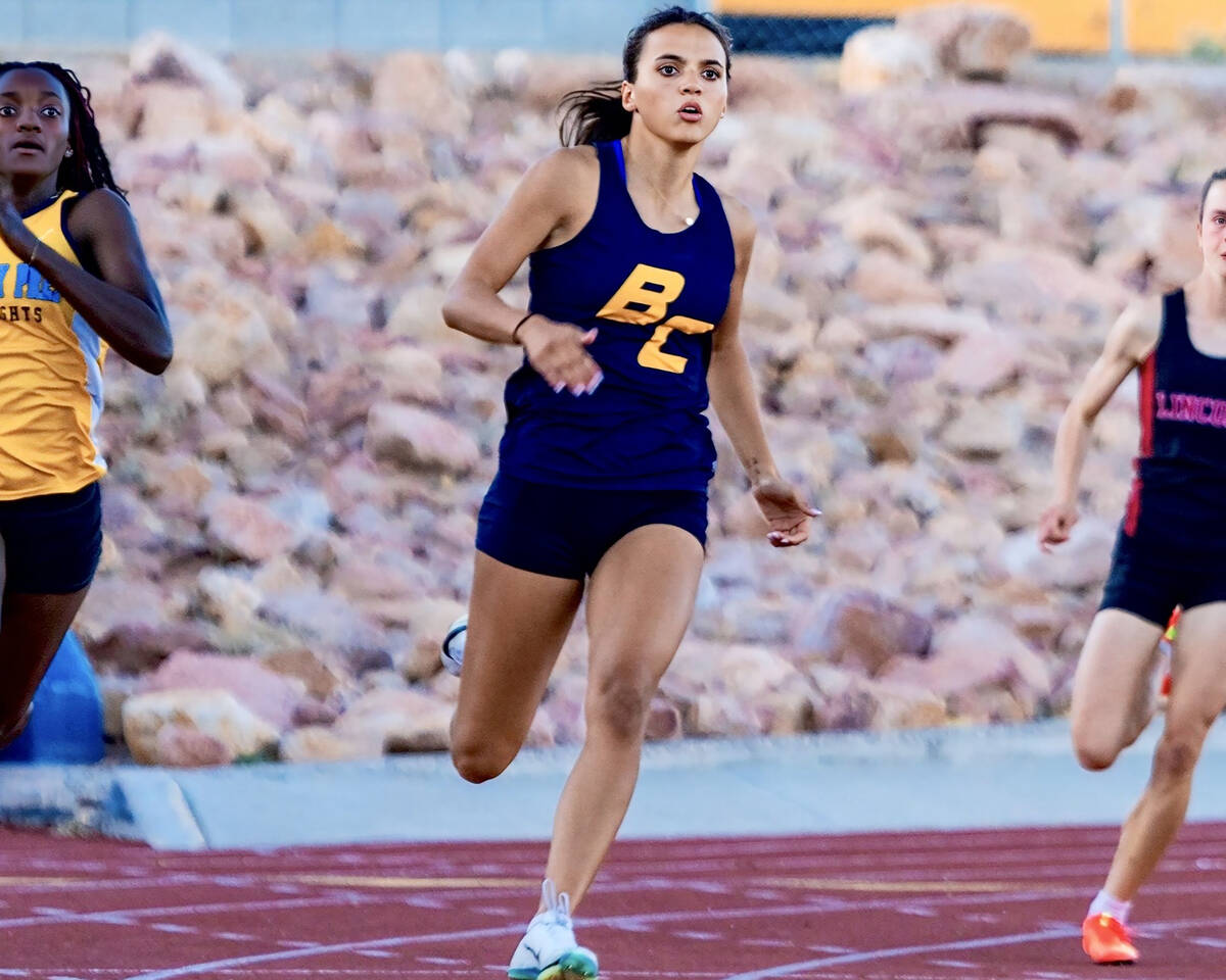 Photo courtesy Cathrin Goode Boulder City's Sancha Jenas-Keogh finishes first in the 100-meter ...
