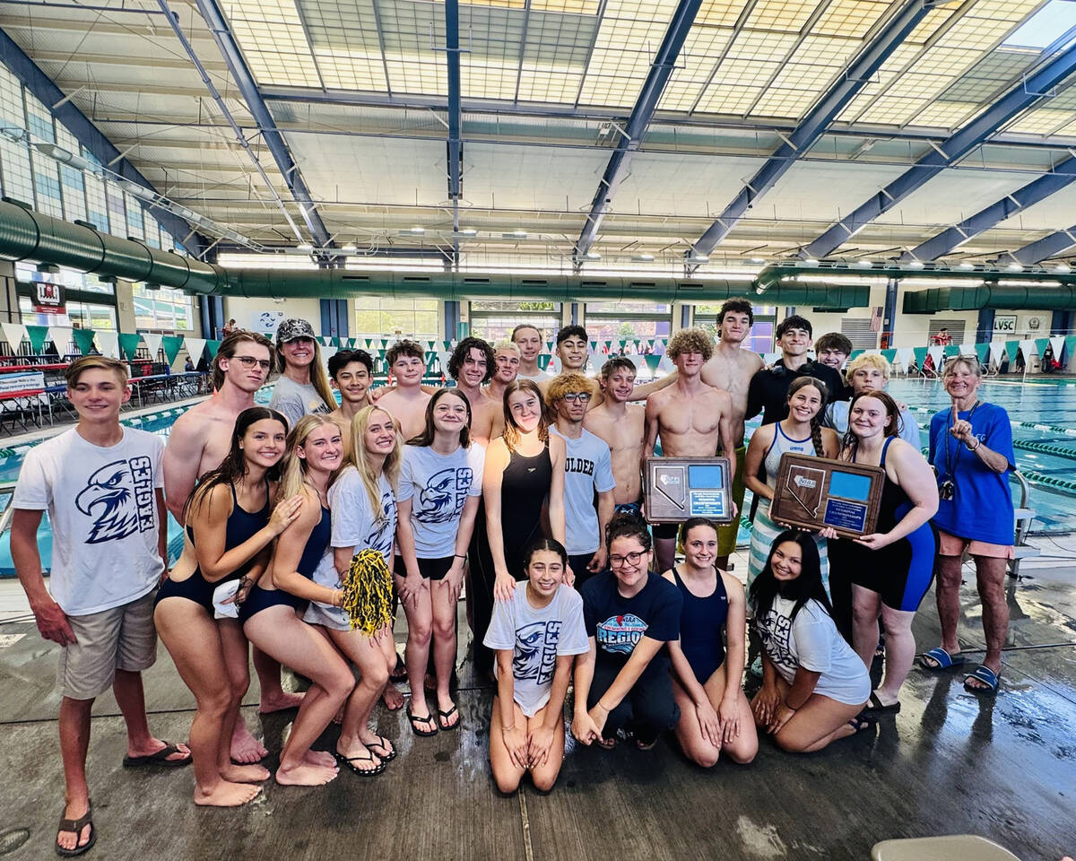 Photos courtesy Sara Carroll Boulder City High School boys and girls swim teams celebrate winni ...