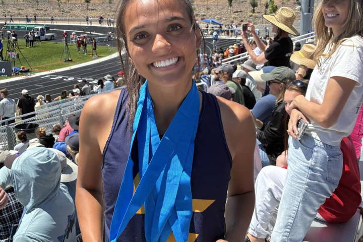 Photo courtesy Mark Misuraca Sancha Jenas-Keogh shows off her medals at this past weekend's tr ...
