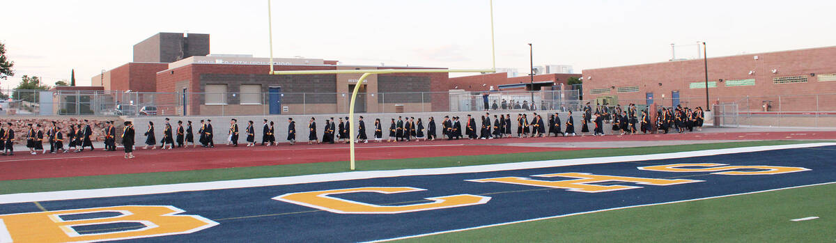 The soon-to-be graduates enter Bruce Eaton Field to the cheers of family and friends.