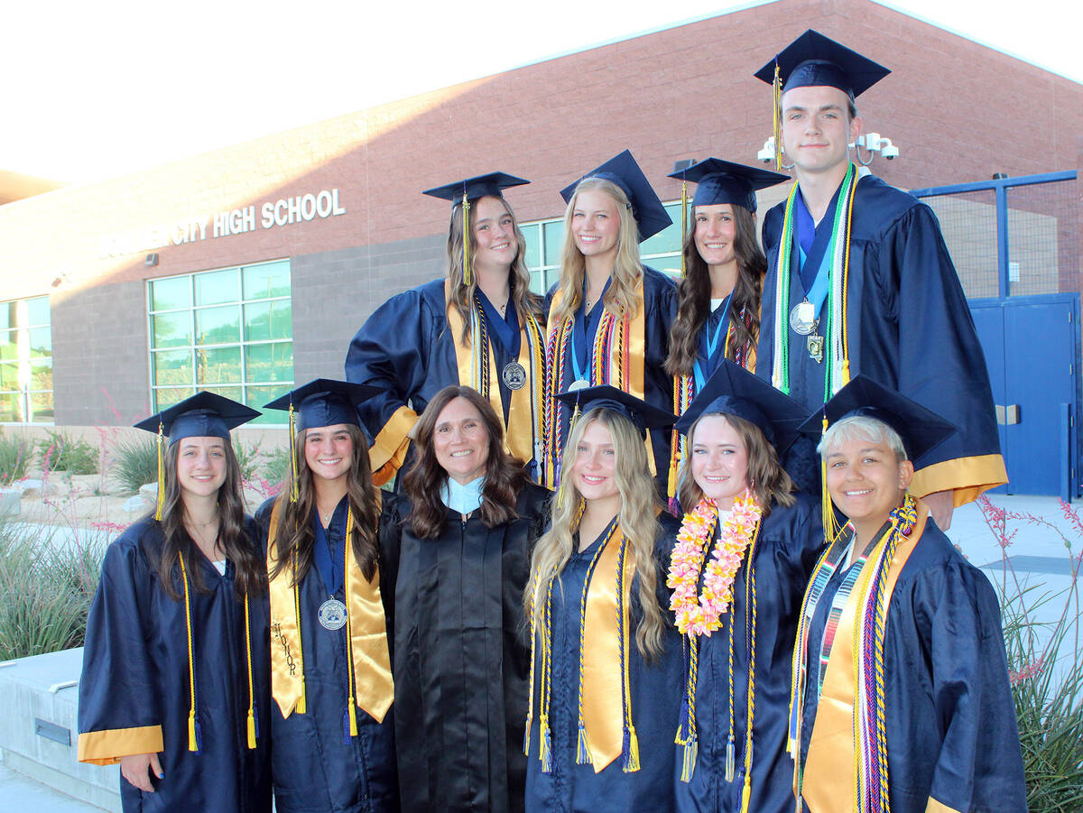 Cheryl Herr, in black, stands with her senior members of student council. Herr, a longtime math ...