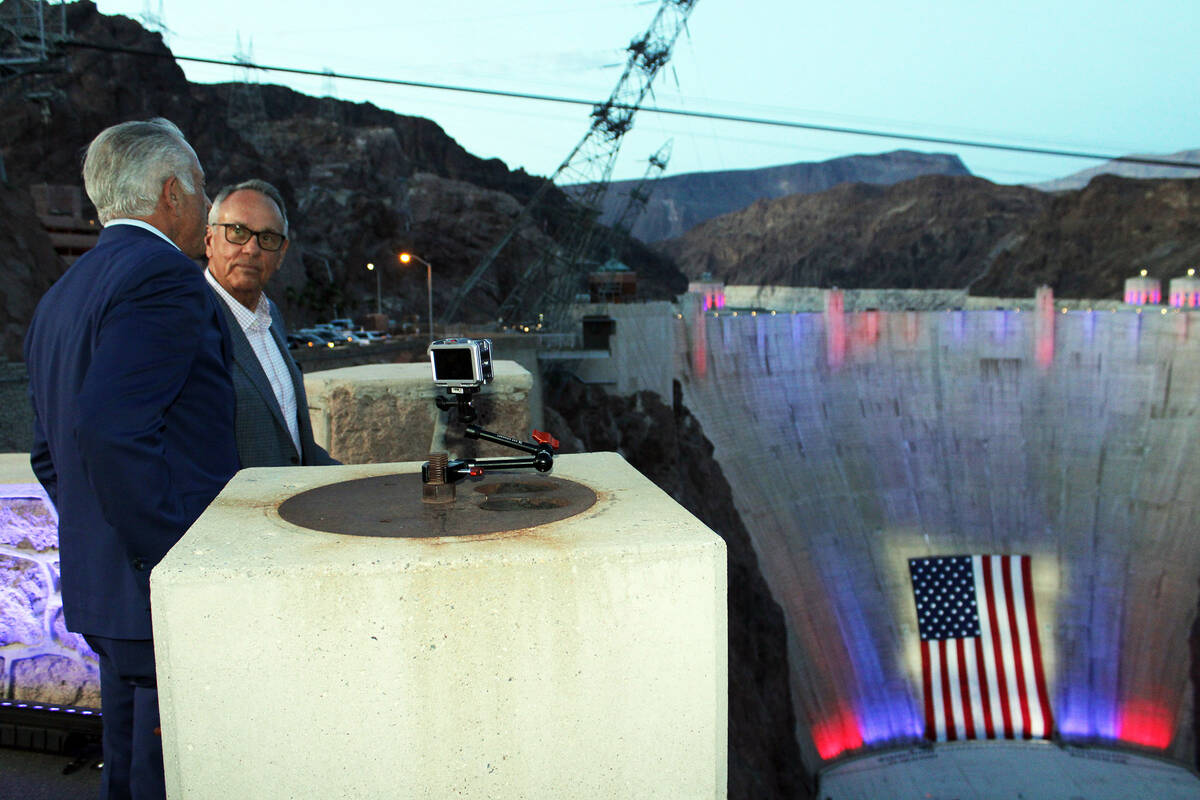 Ron Eland/Boulder City Review Clark County Commissioner Jim Gibson (with glasses) talks with Go ...