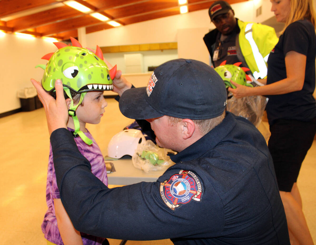 Ron Eland/Boulder City Review file photo Boulder City Fire Department's Capt. Josh Barrone help ...