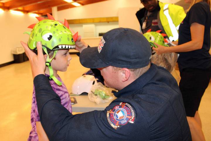 Ron Eland/Boulder City Review file photo Boulder City Fire Department's Capt. Josh Barrone help ...