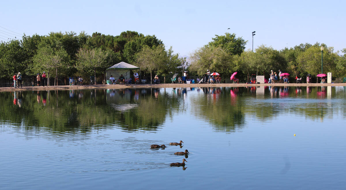 Hundreds of fishermen of all ages lined the banks of the pond at Veterans Memorial Park.