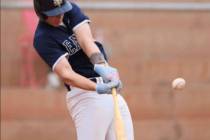 Photo courtesy Cael Starley Boulder City's Spencer Aten puts the ball in play for the Eag ...