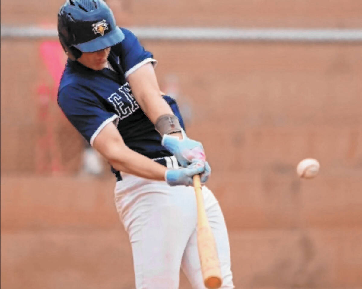 Photo courtesy Cael Starley Boulder City's Spencer Aten puts the ball in play for the Eag ...