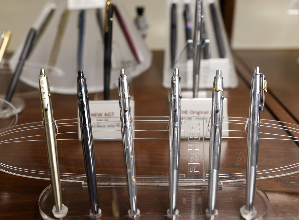 Various Fisher space pens are displayed at the Fisher Space Pen factory on June 5, 2026, in Bou ...
