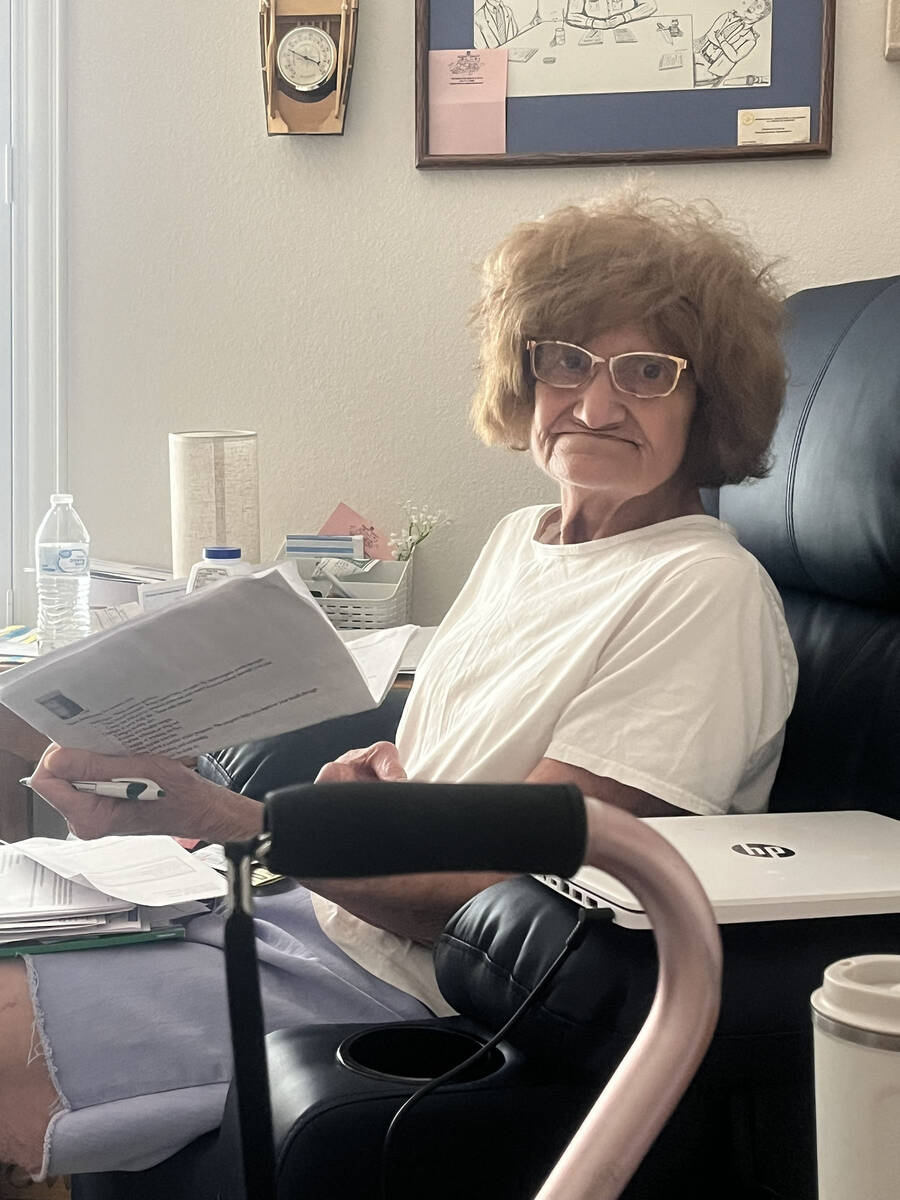 Courtesy Photo Lynne Crose, seen here in her Boulder City home, was the recent victim of fraud ...