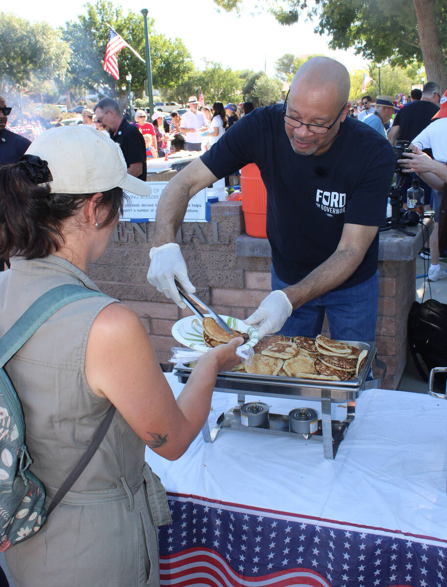 Nevada Attorney General Aaron Ford, who is also a gubernatorial candidate, helped serve Saturda ...