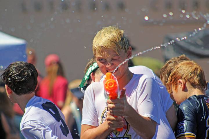 Kace Conley takes aim during the parade’s water zone.