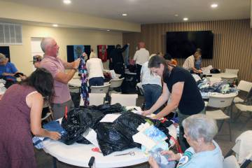 Ron Eland/Boulder City Review About 20 volunteers turned out at St. Christopher's Episcopa ...
