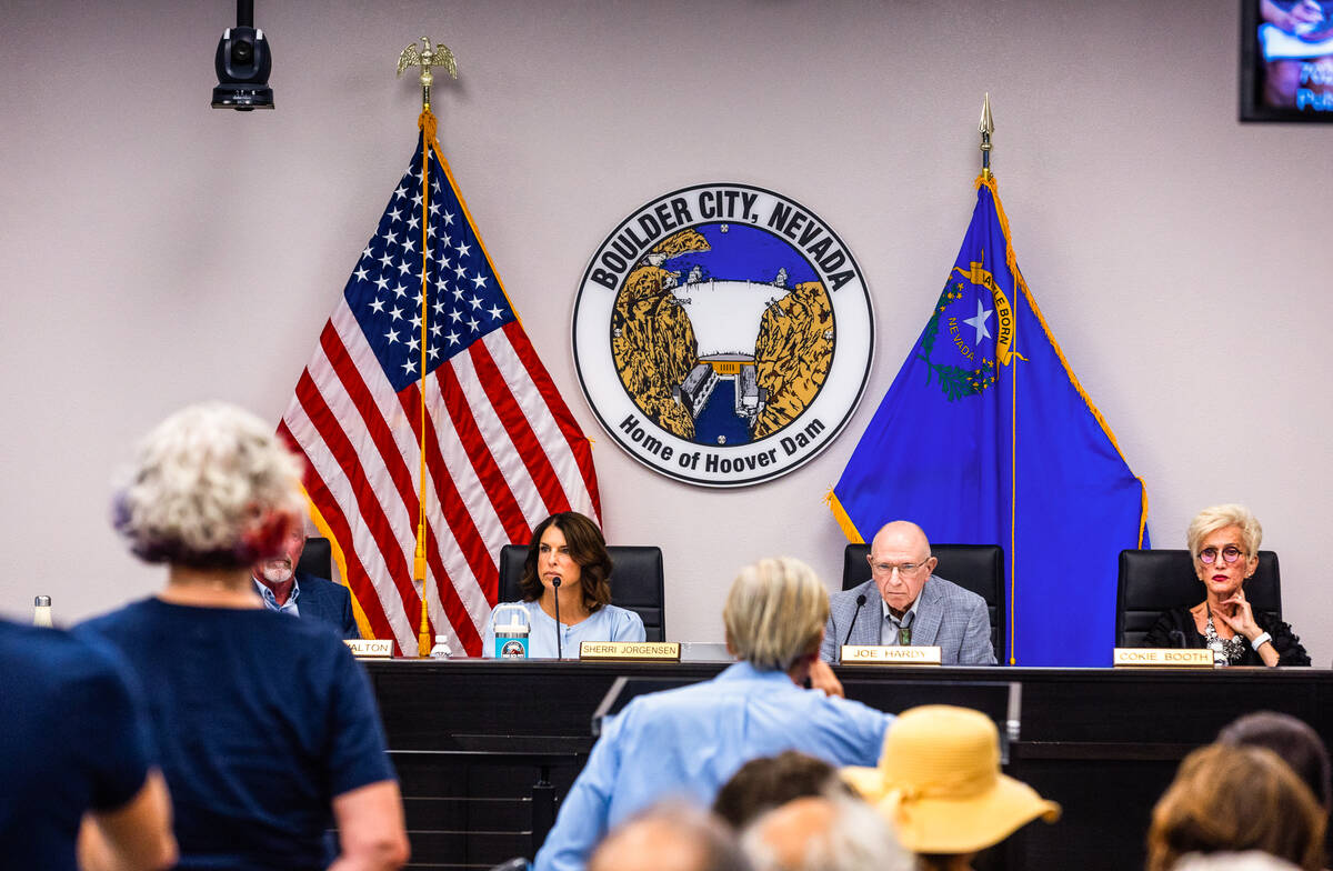 Boulder City Council members Sherri Jorgensen, Joe Hardy and Cokie Booth listen as community me ...