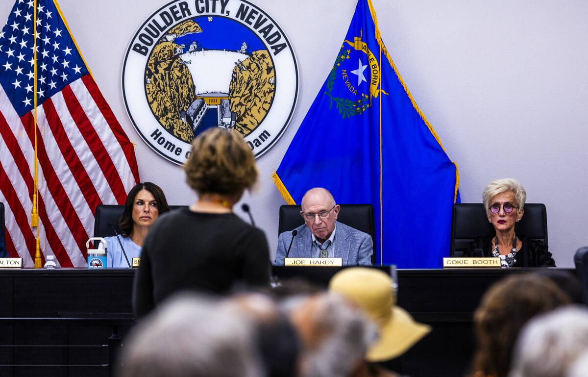 Boulder City Council members Sherri Jorgensen, Joe Hardy and Cokie Booth listen as community me ...