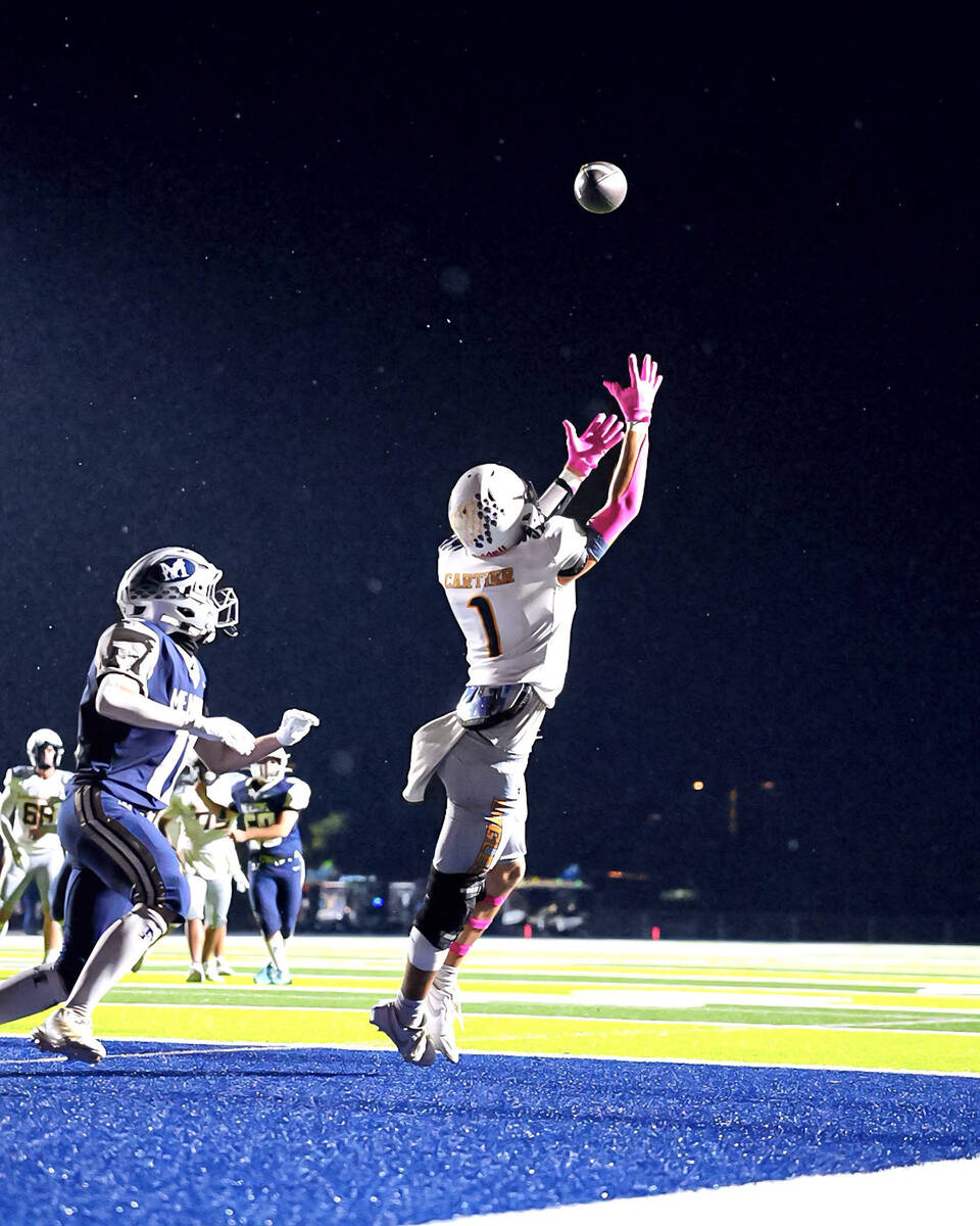 Photo courtesy Cade Braden Ghavyn Cartier locates the ball in the end zone against The Meadows ...