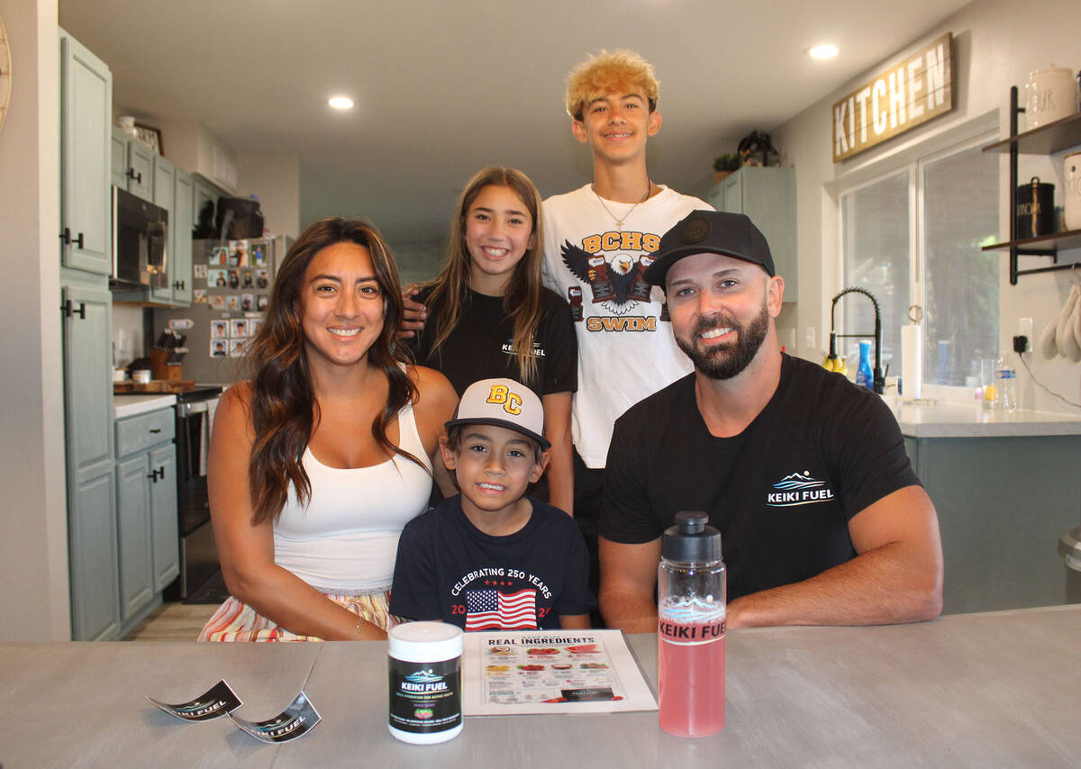 Ron Eland/Boulder City Review Anabel and Alex Smith in their Boulder City home with their three ...