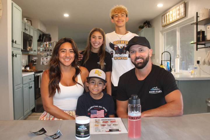 Ron Eland/Boulder City Review Anabel and Alex Smith in their Boulder City home with their three ...