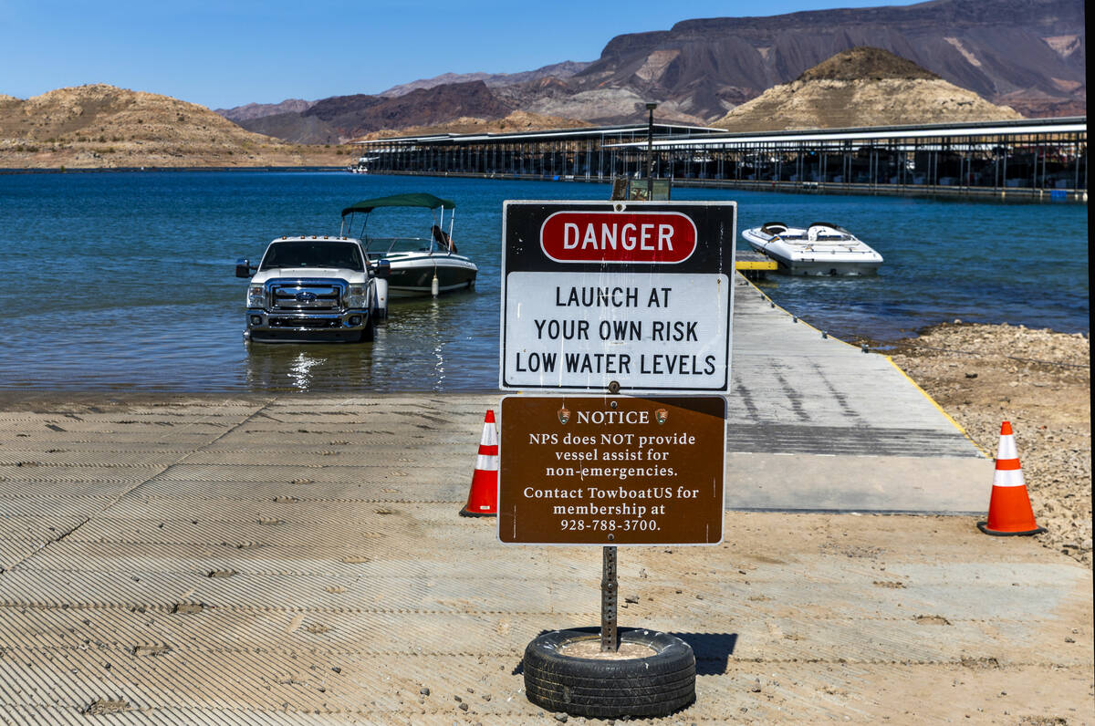 Boats launch at Hemenway Harbor as the Lake Mead water line is nearing a record low on July 7, ...