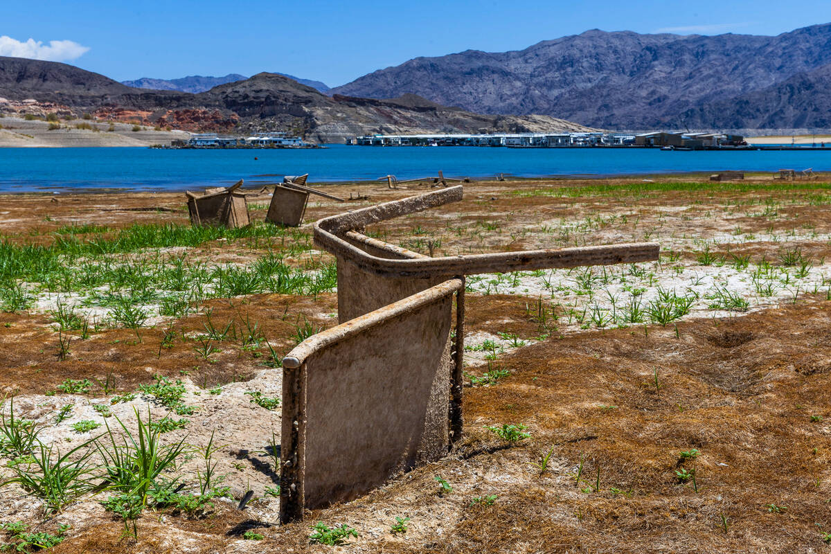 Lost furniture sits along the receding shoreline about the Callville Bay Marina in the Lake Mea ...