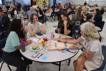 Ron Eland/Boulder City Review During the event, teachers were asked to fill out a variety of qu ...