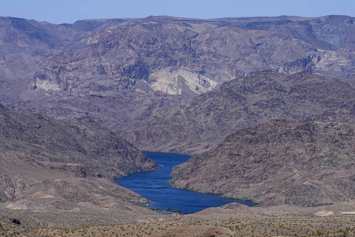 The Colorado River cuts through Black Canyon, June 6, 2023, near White Hills, Ariz. (AP Photo/M ...
