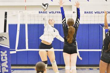 Robert Vendettoli/Boulder Citry Review Going up for a big strike, Boulder City hitter Juliette ...