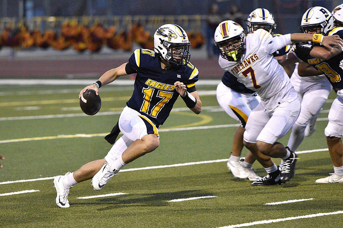 Robert Vendettoli/Boulder City Review Running for a gain up the middle, Boulder City quarterbac ...