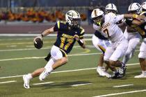 Robert Vendettoli/Boulder City Review Running for a gain up the middle, Boulder City quarterbac ...