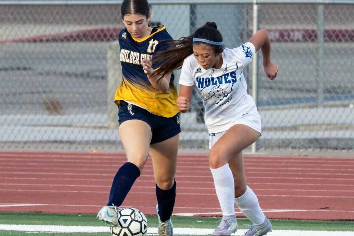 Photo courtesy Chad Schoop Boulder City's Kora Remedi battles with a Basic player for positioni ...