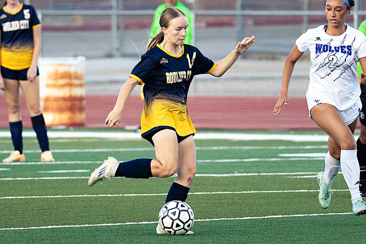 Photo courtesy Chad Schoop Boulder City's Susan Muir makes her way up field against Basic ...