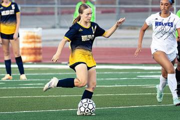 Photo courtesy Chad Schoop Boulder City's Susan Muir makes her way up field against Basic ...