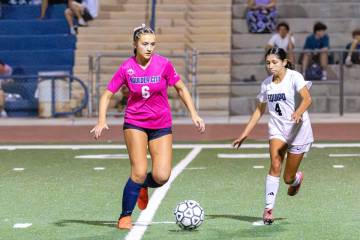 Photo courtesy Chad Schoop Boulder City girls soccer star Malley Jobin makes a move upfield ag ...