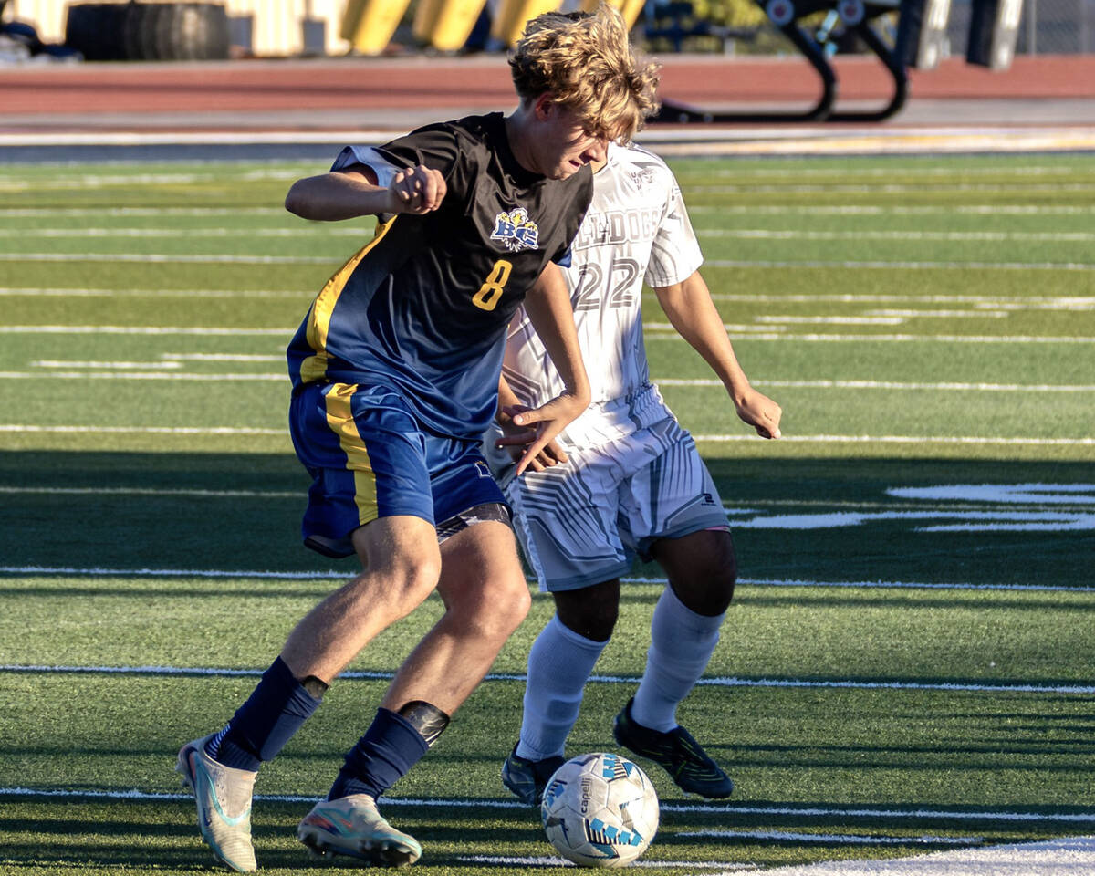 Photo courtesy Chad Schoop Boulder City boys soccer star Kayden Wells takes the ball away from ...