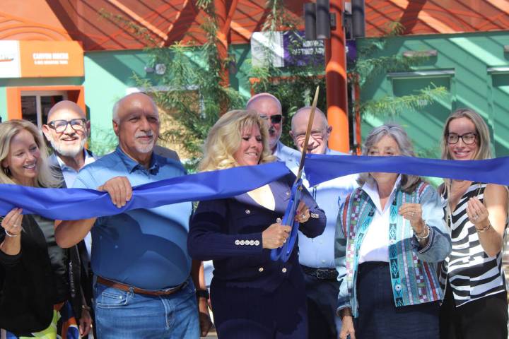 Ron Eland/Boulder City Review Flanked by state and local elected officials and invited guests, ...