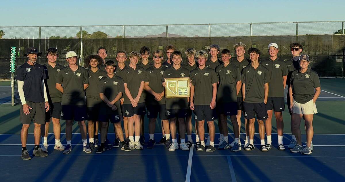Boulder City High School boys tennis celebrates their 3A regional championship on Oct. 8.
