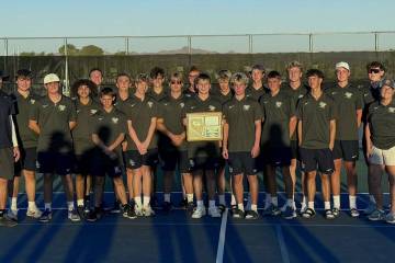 Boulder City High School boys tennis celebrates their 3A regional championship on Oct. 8.