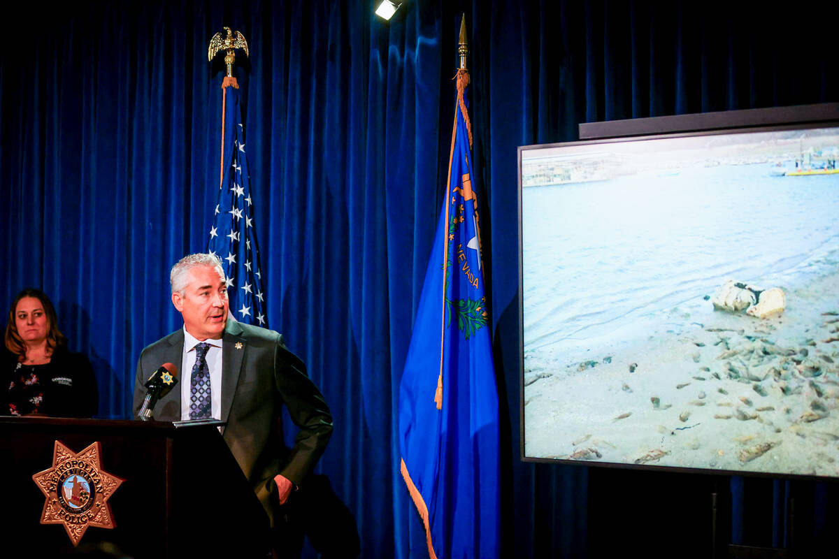 Metro Lt. Robert Price displays a photo of the barrel found at Lake Mead on May 1, 2022, during ...